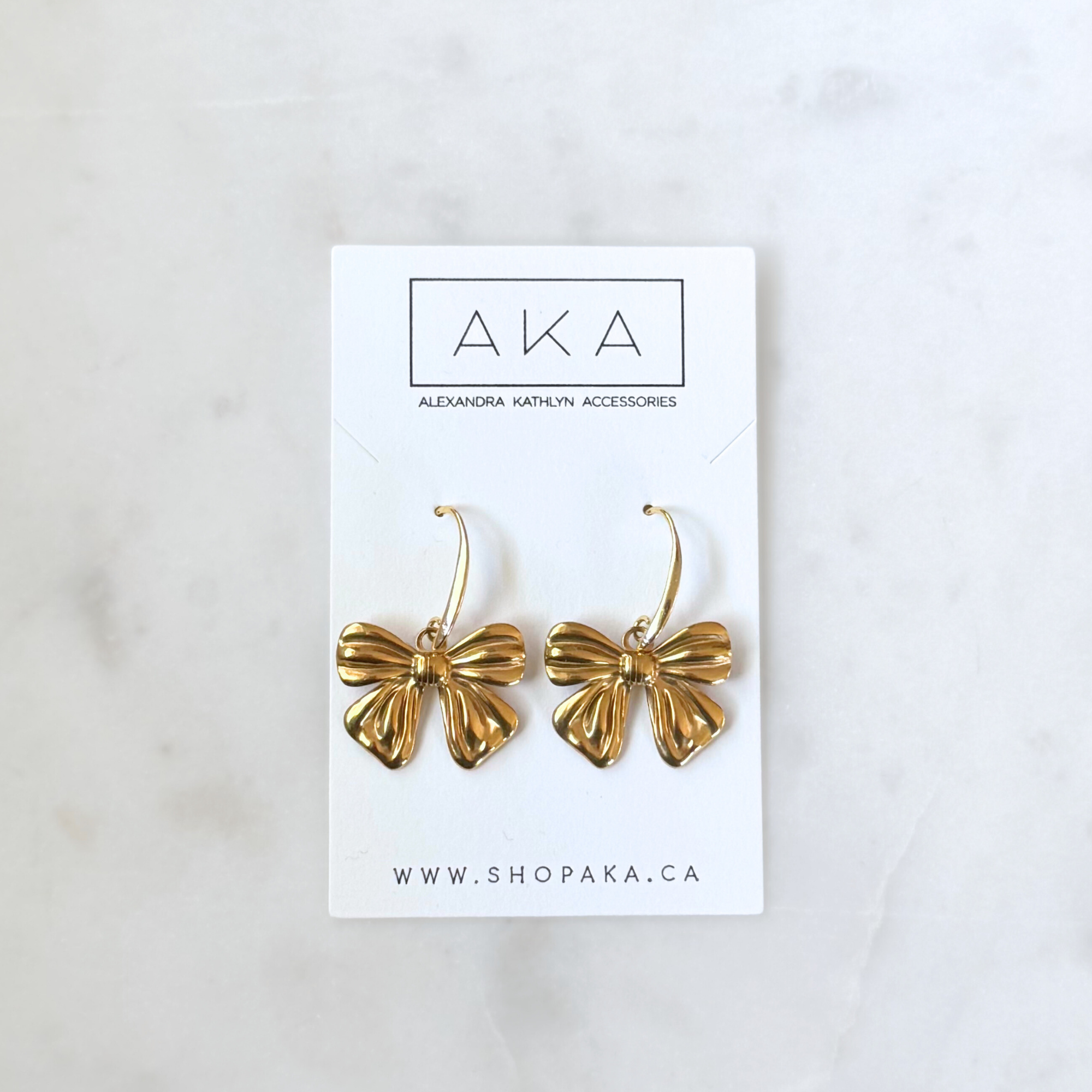 LOU | Golden Bow Statement Earrings